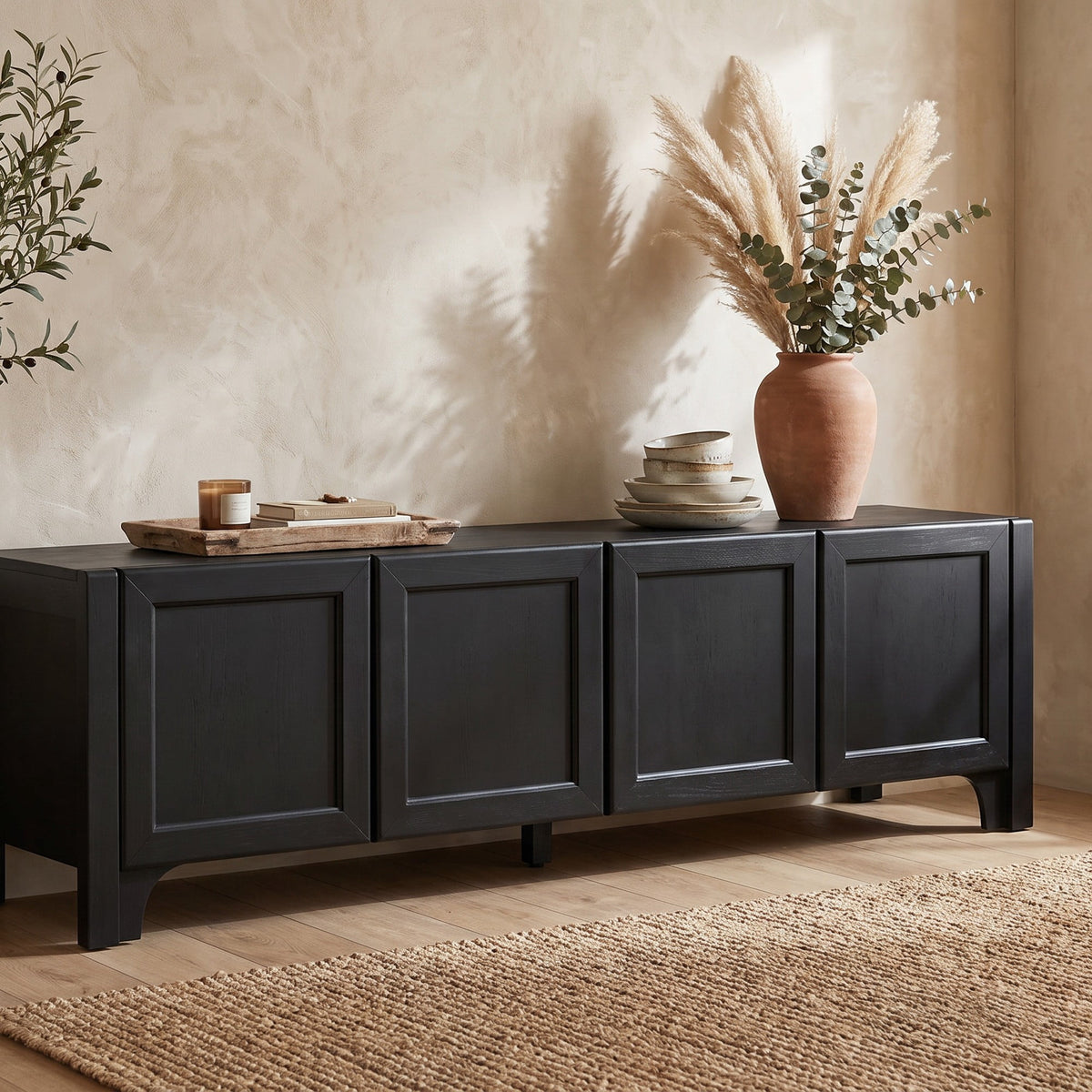 70" Low-Profile Entertainment Center with Leather-Wrapped Doors & Open Shelving Modern Black TV Stand, Holds Up to 300 lbs